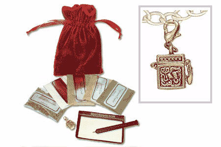 Aphrodite Charm love talisman kit with pendant, herbs, powders, red pouch, pen, and paper for enchanting relationships